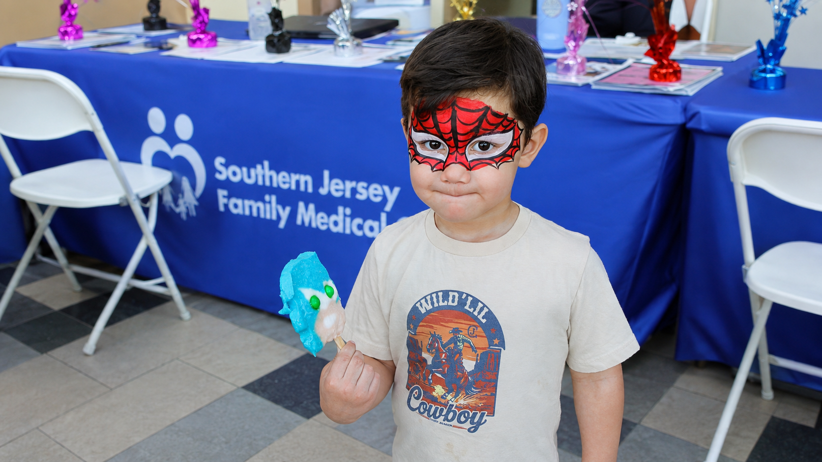 Community festival with neighborhood families enjoying a public celebration